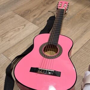 Pink Acoustic Guitar with Black Accents